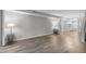 Open-concept living room featuring wood-style floors, connecting seamlessly to the kitchen at 117 Scott Ln, Chapel Hill, NC 27514