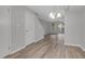 Spacious living room with updated flooring and an open floor plan at 117 Scott Ln, Chapel Hill, NC 27514