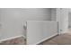 Carpeted staircase featuring white trim, leading upstairs and creating a seamless transition at 117 Scott Ln, Chapel Hill, NC 27514