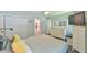 This bedroom features neutral colors and a walk-in bathroom at 1205 Hillsborough Rd, Chapel Hill, NC 27516