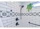 Elegant walk-in shower featuring designer black and gray tiles at 1205 Hillsborough Rd, Chapel Hill, NC 27516