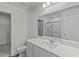 Bathroom has a white vanity, large mirror, and glass shower at 1250 Pond Overlook Dr, Nashville, NC 27856