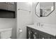 Updated bathroom with modern vanity, lighting, and fixtures at 136 Dixie Ln, Youngsville, NC 27596