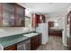 Kitchen with granite countertops, stainless appliances and wood cabinets at 136 Dixie Ln, Youngsville, NC 27596