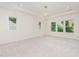 Large bedroom with ample natural light and elegant tray ceiling at 1417 Westmoreland Dr, Raleigh, NC 27612