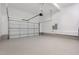 A spacious garage with epoxy flooring and an automatic door provides ample parking and storage space at 1417 Westmoreland Dr, Raleigh, NC 27612
