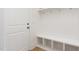 Clean mudroom with a built-in bench, cubbies, and coat hooks near the entrance at 1417 Westmoreland Dr, Raleigh, NC 27612