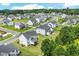 Aerial view of community showing manicured lawns and gorgeous homes at 1425 Sierra Glen Cir, Apex, NC 27502