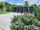 Community mailboxes surrounded by vibrant flowers at 1425 Sierra Glen Cir, Apex, NC 27502