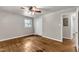 Bedroom features hardwood floors, a ceiling fan, and a closet at 1500 Lakeside Dr, Garner, NC 27529