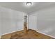 Bedroom features hardwood floors, a closet, and a neutral color scheme at 1500 Lakeside Dr, Garner, NC 27529