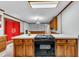 Updated kitchen with classic wood cabinetry and bright countertops at 1500 Lakeside Dr, Garner, NC 27529