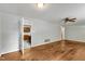 Hardwood flooring leading to the kitchen in this open concept living area at 1500 Lakeside Dr, Garner, NC 27529