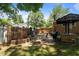 Charming brick patio featuring a round table with chairs, and a brick outdoor cooking area at 1542 W Davis St, Burlington, NC 27215
