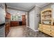 Spacious kitchen features wooden cabinetry, granite counters, mosaic tile backsplash, and modern appliances at 1542 W Davis St, Burlington, NC 27215