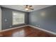 Comfortable bedroom with hardwood floors and a bright window at 168 Melody Ln, Cameron, NC 28326