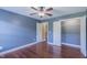 Bedroom featuring hardwood floors, closet, and doorway at 168 Melody Ln, Cameron, NC 28326