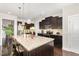 Open kitchen design with granite island and stainless appliances, perfect for entertaining at 1726 Rapids Ct, Franklinton, NC 27525