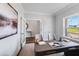 Home office featuring a modern desk, neutral walls, and plenty of natural light at 182 E Fountainhead Ln, Garner, NC 27529