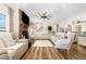 Bright and airy living room featuring a cozy fireplace and an open floor plan at 190 Mitchells Chapel Road, Pittsboro, NC 27312