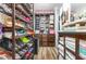 Organized walk-in closet with custom shelving and ample storage for clothes and accessories at 190 Mitchells Chapel Road, Pittsboro, NC 27312