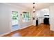 Eat-in kitchen featuring an exterior door, bright light, and stainless steel appliances at 1975 Oakridge Duncan Rd, Fuquay Varina, NC 27526