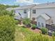 Aerial view of backyard showing fencing, landscaping, and deck at 2101 Piney Brook Rd # 102, Raleigh, NC 27614