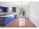 Bright and airy kitchen and dining area featuring hardwood floors and modern lighting at 2101 Piney Brook Rd # 102, Raleigh, NC 27614