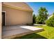View of the concrete back patio and green lawn at 2129 Glade Valley Ln, Morrisville, NC 27560