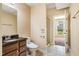 Bathroom with a granite vanity, tile floors and a walk-in shower with glass door at 2129 Glade Valley Ln, Morrisville, NC 27560
