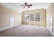 Spacious carpeted bedroom with dormer window and two closets offers ample room at 2129 Glade Valley Ln, Morrisville, NC 27560