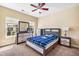 Cozy bedroom features neutral walls, plush carpet, and a ceiling fan for added comfort at 2129 Glade Valley Ln, Morrisville, NC 27560