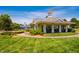 Community gazebo structure with seating area and playground in the background at 2129 Glade Valley Ln, Morrisville, NC 27560