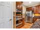 This kitchen includes stainless steel double ovens and refrigerator with custom cabinets at 2129 Glade Valley Ln, Morrisville, NC 27560