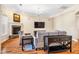 Cozy living room showcases a stone fireplace and comfortable seating with a great view at 2129 Glade Valley Ln, Morrisville, NC 27560