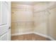 Empty walk-in closet with wire shelving ready for organizing clothes, shoes, and accessories at 2129 Glade Valley Ln, Morrisville, NC 27560