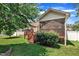 Back porch features an inviting screened-in porch and a wood deck, perfect for relaxing outdoors at 22 Evie Dr, Smithfield, NC 27577