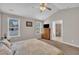 Bright bedroom featuring neutral walls, a ceiling fan, and a window with natural light at 22 Evie Dr, Smithfield, NC 27577