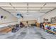 Spacious two-car garage featuring ample storage space and convenient workbench area at 22 Evie Dr, Smithfield, NC 27577