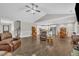 Spacious open floor plan featuring living room, kitchen with island, and dining area at 22 Evie Dr, Smithfield, NC 27577