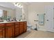 Well-lit bathroom featuring a spacious vanity, drawers, and ample counter space at 23 Northern Way Ct, Durham, NC 27712