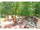 Spacious outdoor deck with seating, perfect for relaxing and entertaining guests at 23 Northern Way Ct, Durham, NC 27712