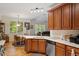 Beautiful eat-in kitchen with stainless appliances, bright countertops, and hardwood floors at 23 Northern Way Ct, Durham, NC 27712