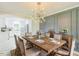 Dining room view to the kitchen featuring a wooden table with seating for six at 2300 Radius Cir, Sanford, NC 27330