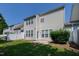 Exterior view of backyard, showcasing the lawn and patio at 238 Royal Tower Way, Cary, NC 27513