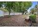 Large backyard featuring a wooden bench and a garden at 2603 Stafford Ave # Apt C, Raleigh, NC 27607