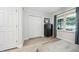 Bedroom featuring a closet and a window bringing in natural light with views to the screened porch at 2603 Stafford Ave # Apt C, Raleigh, NC 27607