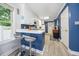 Charming kitchen with breakfast bar and white cabinets for a bright, airy feel at 2603 Stafford Ave # Apt C, Raleigh, NC 27607