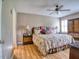 Comfortable bedroom featuring natural light, matching furnishings, and hardwood floors at 2817 Buckboard Ln, Raleigh, NC 27603
