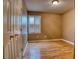 Bedroom featuring hardwood floors, double-door closet, and natural light at 2817 Buckboard Ln, Raleigh, NC 27603